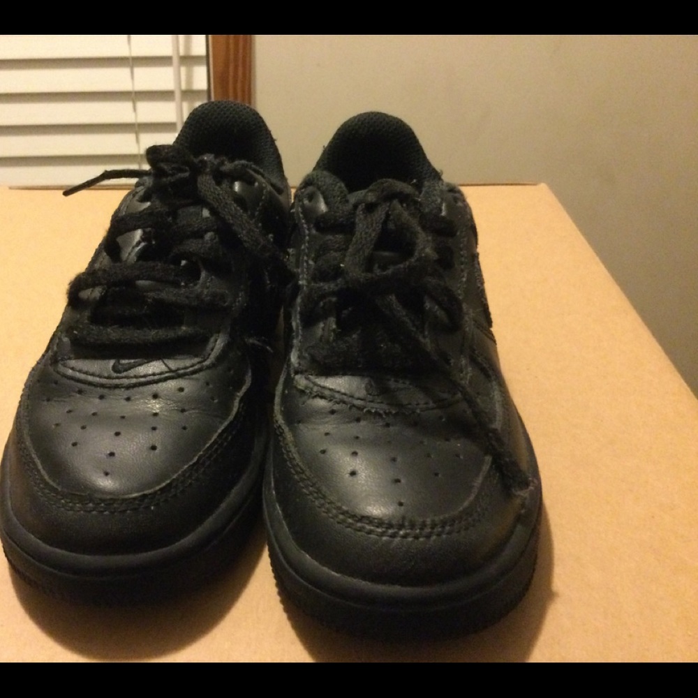 Boys black Nike sneakers